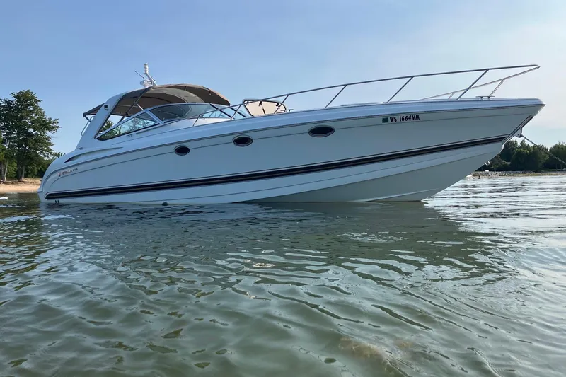 Slide: The Image of 2001 Formula 400ss cabin interior with kitchenette and seating area. - 4