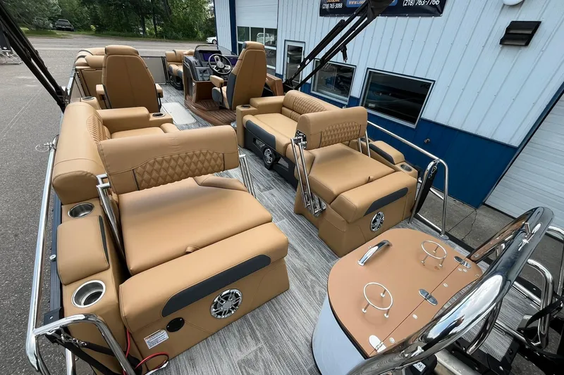 Slide: The Image of 2025 Avalon Catalina Quad Lounger Shift Windshield with luxurious tan seating and modern design. - 19