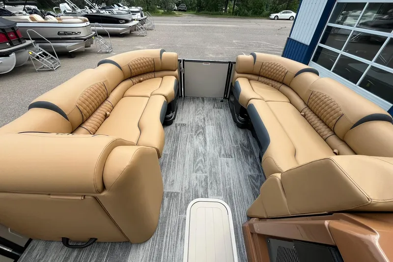 Slide: The Image of 2025 Avalon Catalina Quad Lounger with tan seating and modern design. - 25