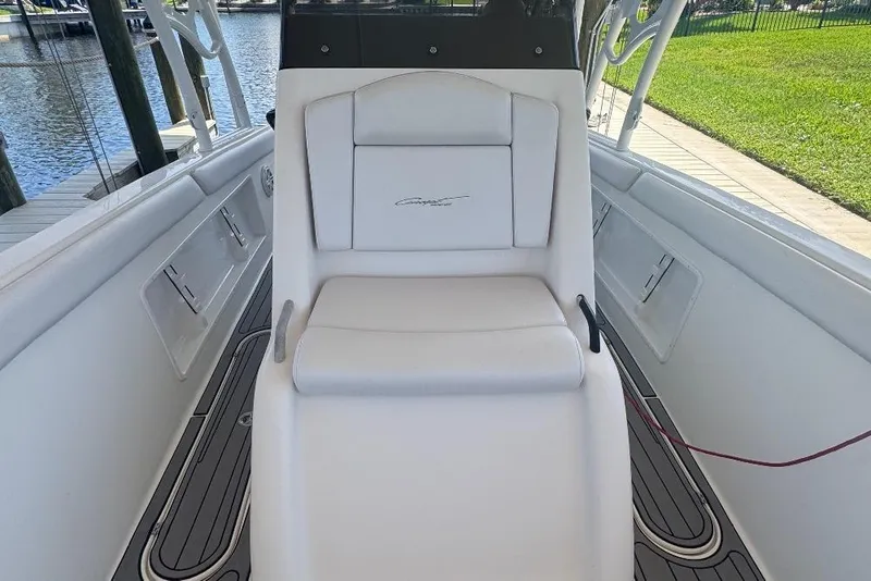 Slide: The Image of White seating on a 2012 Concept 32 boat, dockside view. - 17