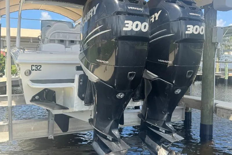 Slide: The Image of 2012 Concept 32 boat with twin Mercury 300 Verado engines on a lift. - 4