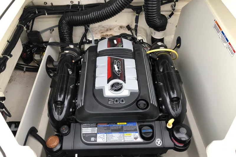 Slide: The Image of 2021 Bayliner VR5 Bowrider I/O engine compartment with Mercury 4.5L 200 HP engine. - 11