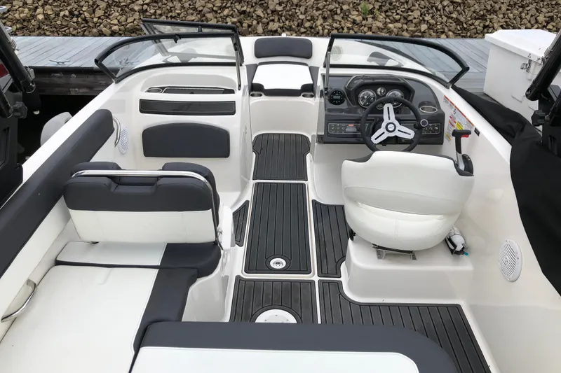 Slide: The Image of 2021 Bayliner VR5 Bowrider I/O interior with sleek seating and modern dashboard. - 7