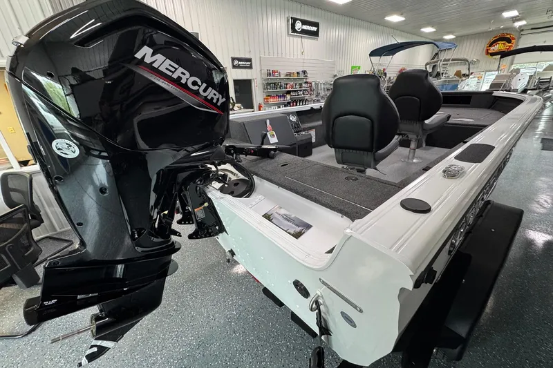 Slide: The Image of 2025 Crestliner 1850 Pro Tiller boat with Mercury engine in showroom. - 4