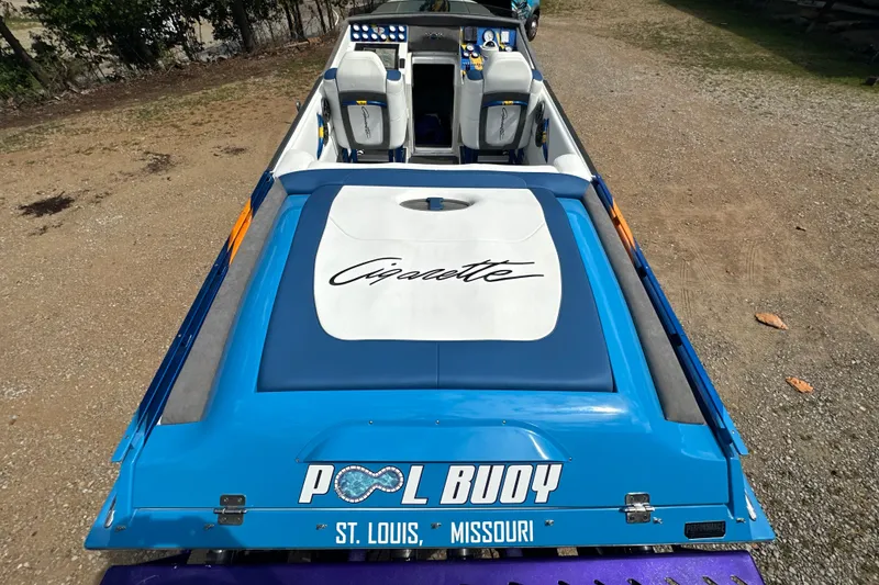 Slide: The Image of 2001 Cigarette 38 Top Gun boat, blue and white, labeled "Pool Buoy" in St. Louis, Missouri. - 15