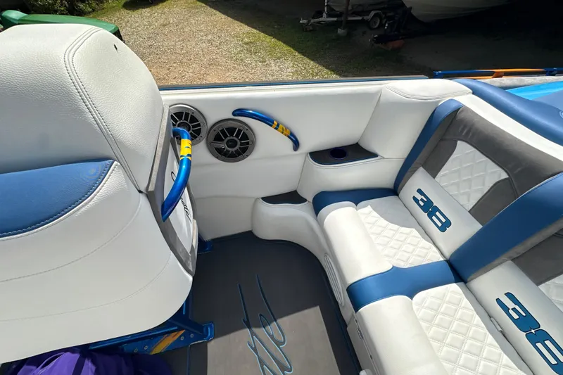 Slide: The Image of Interior of 2001 Cigarette 38 Top Gun boat with blue and white seating. - 20