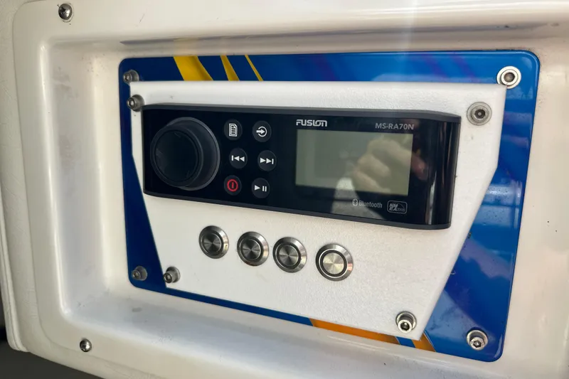 Slide: The Image of Fusion MS-RA70N stereo system on 2001 Cigarette 38 Top Gun boat dashboard. - 29