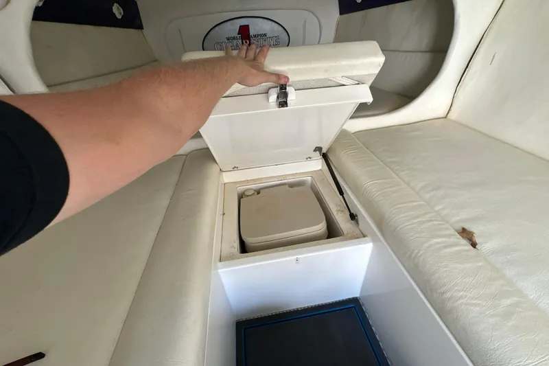 Slide: The Image of Interior of a 2001 Cigarette 38 Top Gun boat with storage compartment open. - 37