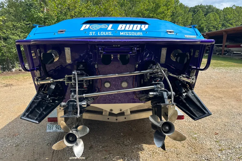 Slide: The Image of Rear view of a 2001 Cigarette 38 Top Gun boat with dual propellers. - 39