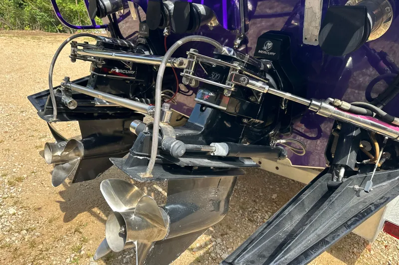 Slide: The Image of 2001 Cigarette 38 Top Gun boat with dual Mercury outboard engines and propellers. - 41