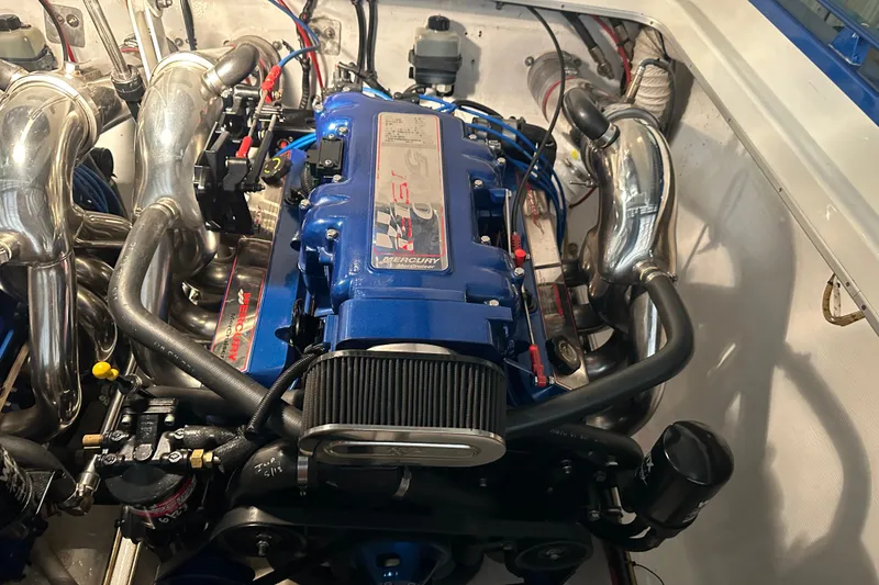 Slide: The Image of Engine of a 2001 Cigarette 38 Top Gun boat, featuring Mercury components. - 45