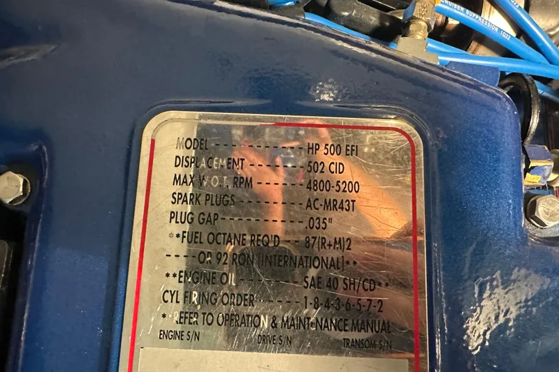 Slide: The Image of Engine specifications plaque on a 2001 Cigarette 38 Top Gun boat. - 52