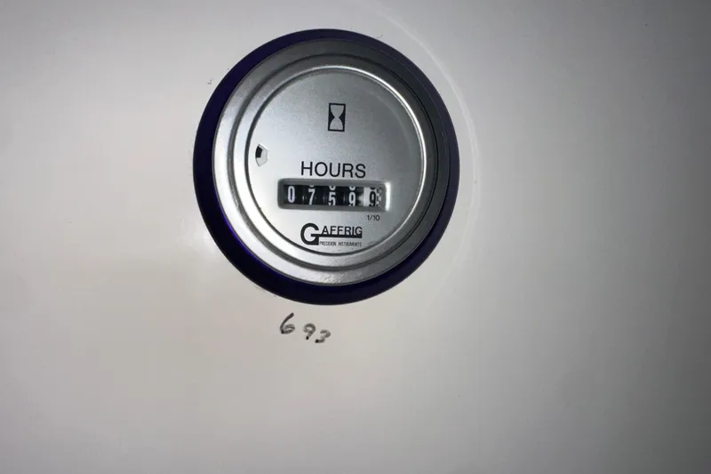 Slide: The Image of Hour meter reading 759.9 hours on a 2001 Cigarette 38 Top Gun boat. - 53