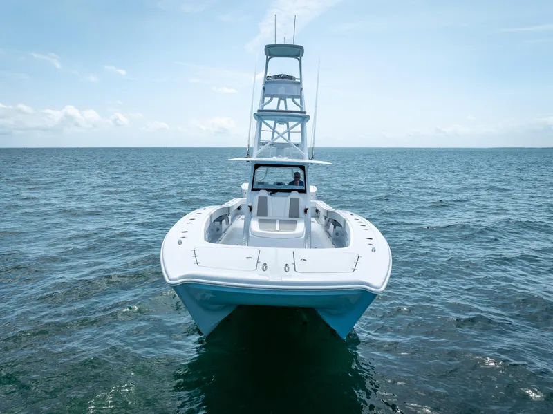 Slide: The Image of 2024 Freeman NEW QUAD V10s 400 HP boat on open water. - 11