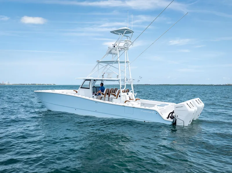 Slide: The Image of 2024 Freeman NEW QUAD V10s 400 HP boat on open water. - 17