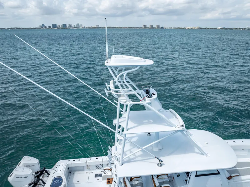 Slide: The Image of Freeman NEW 2024 boat with quad V10s 400 HP engines on open water. - 25