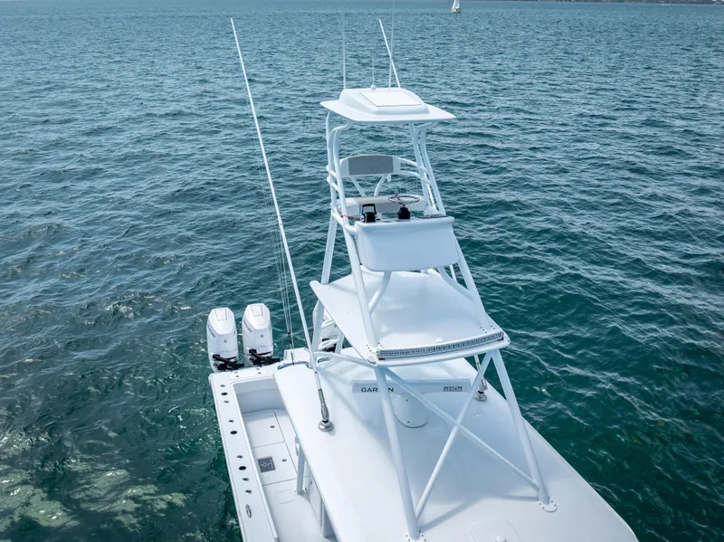 Slide: The Image of 2024 Freeman boat with quad V10 400 HP engines on open water. - 27