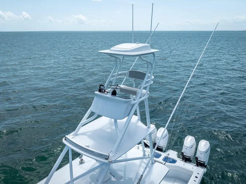 Slide: The Image of 2024 Freeman NEW QUAD V10s 400 HP boat on open water. - 29