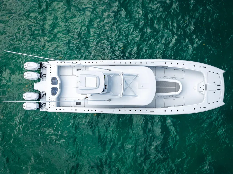 Slide: The Image of Aerial view of 2024 Freeman NEW QUAD V10s 400 HP boat on water. - 30