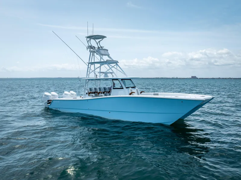 Slide: The Image of Freeman NEW 2024 boat with QUAD V10s 400 HP engines on open water. - 7