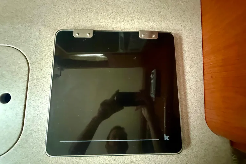 Slide: The Image of Black glass cooktop on 2006 Pro-Line 32 Express boat kitchen counter. - 10