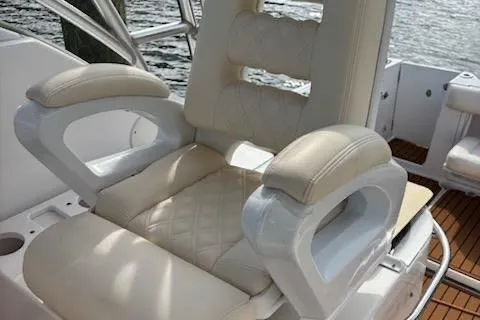 Slide: The Image of Luxury seating on 2006 Pro-Line 32 Express boat with quilted upholstery. - 6