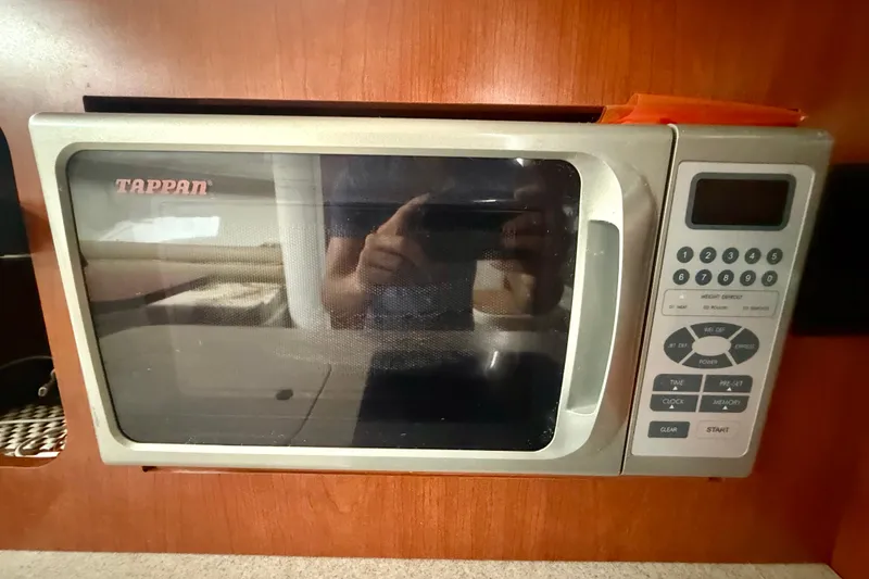 Slide: The Image of Tappan microwave in 2006 Pro-Line 32 Express boat kitchen setup. - 9