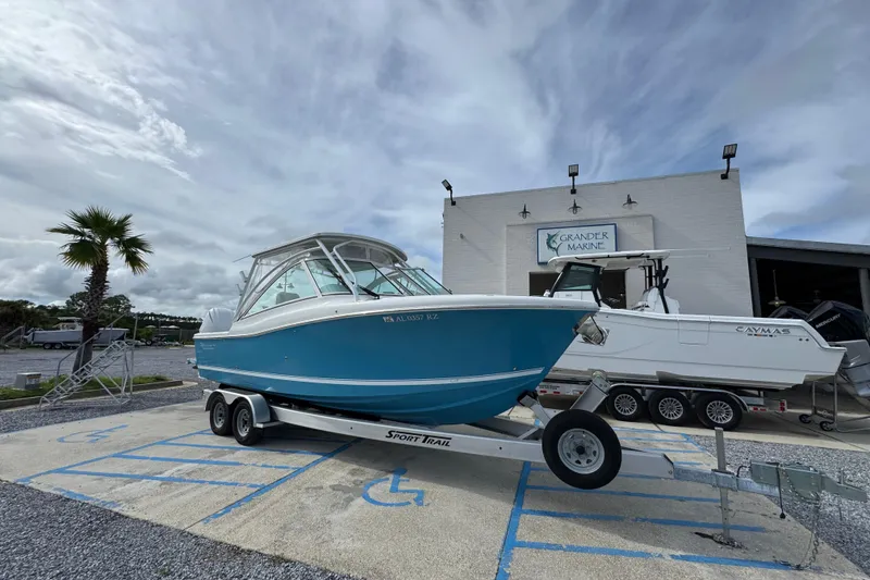 Slide: The Image of 2023 Albemarle 27 Dual Console boat on trailer at Grander Marine dealership. - 3