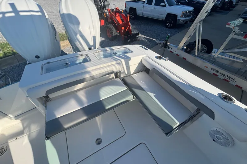 Slide: The Image of 2023 Albemarle 27 Dual Console boat interior with seating and storage compartments. - 39
