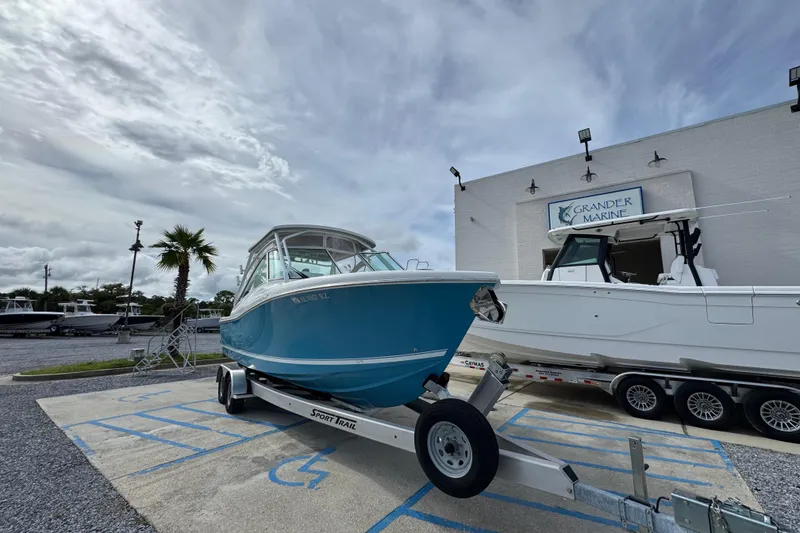 Slide: The Image of 2023 Albemarle 27 Dual Console boat on trailer at Grander Marine dealership. - 4