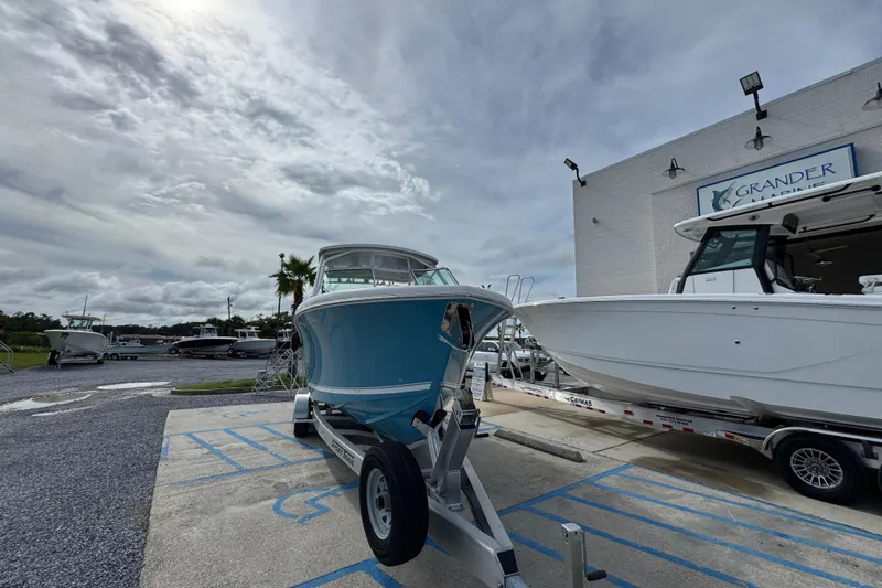 Slide: The Image of 2023 Albemarle 27 Dual Console boat on trailer at Grander Marine dealership. - 5