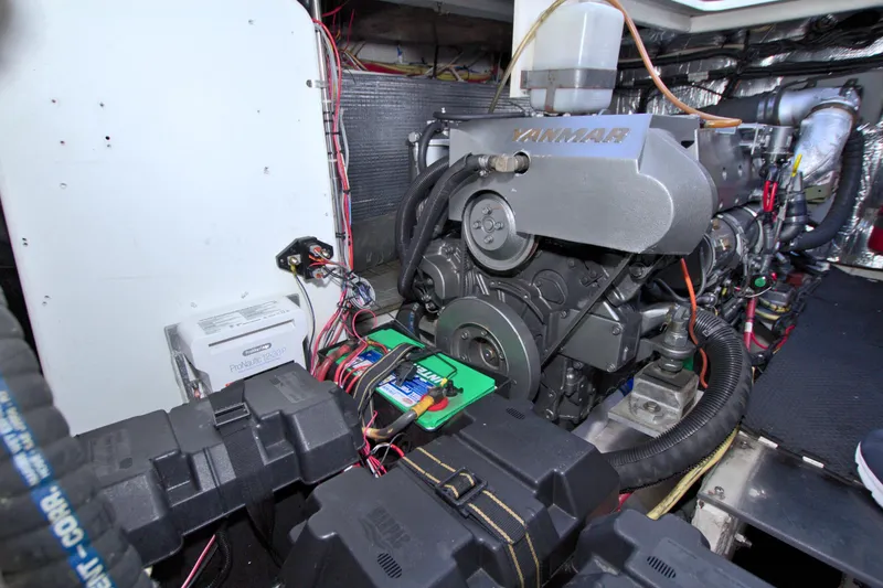 Slide: The Image of Engine room of 2004 Cruisers Yachts 370 Express with Yanmar engine components. - 53
