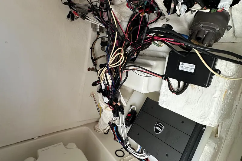 Slide: The Image of Wiring and components inside a 2015 Sea Hunt Ultra 234 boat. - 28