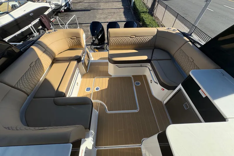 Slide: The Image of Luxurious seating area on 2026 Sea Ray Sundancer 370 Outboard boat. - 11