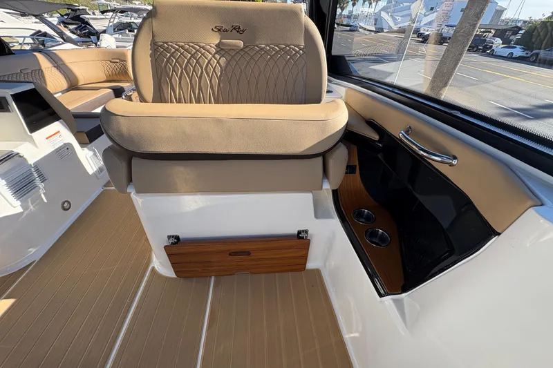 Slide: The Image of 2026 Sea Ray Sundancer 370 Outboard interior with luxurious seating and modern design. - 15