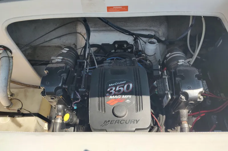 Slide: The Image of Engine compartment of a 2005 Rinker 232 Captiva Cuddy with MerCruiser 350 MAG MPI. - 3