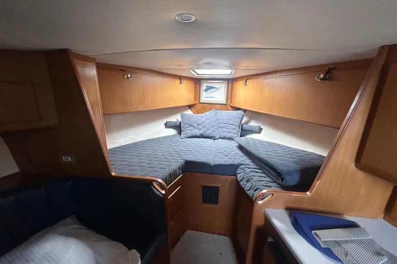 Slide: The Image of Cozy cabin interior of 2006 Topaz 40 Express yacht with comfortable bedding. - 35