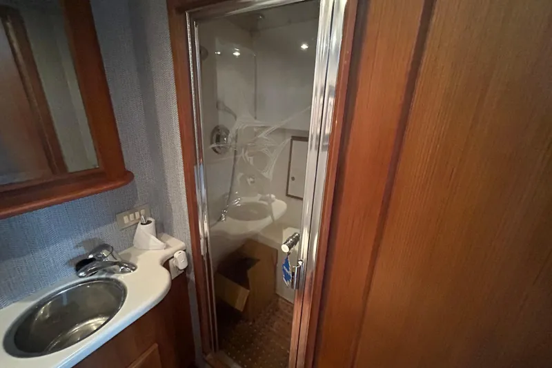 Slide: The Image of Bathroom interior of 2006 Topaz 40 Express yacht with shower and sink. - 42