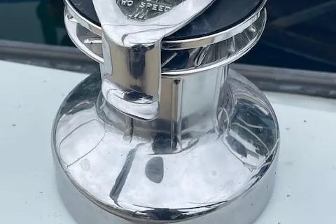 Slide: The Image of Chrome winch on 1976 Ranger 33 sailboat deck. - 8