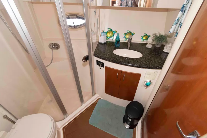 Slide: The Image of Bathroom interior of 2005 Carver 360 Mariner yacht with shower and vanity. - 19