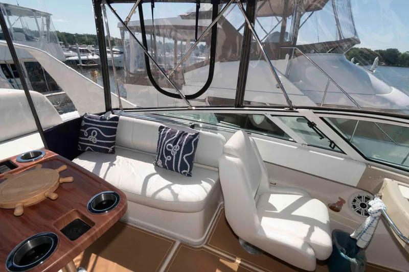 Slide: The Image of Interior of 2005 Carver 360 Mariner yacht with seating and nautical decor. - 9
