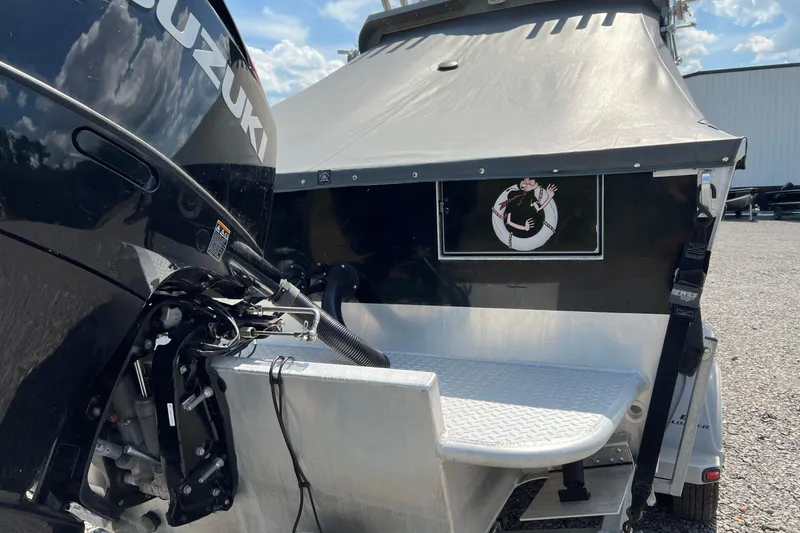 Slide: The Image of 2021 Hewescraft 220 Ocean Pro ET boat with Suzuki engine, outdoor setting. - 14