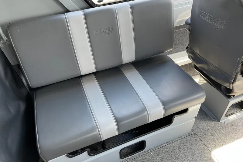 Slide: The Image of 2021 Hewescraft 220 Ocean Pro ET boat seating, gray and black upholstery. - 17