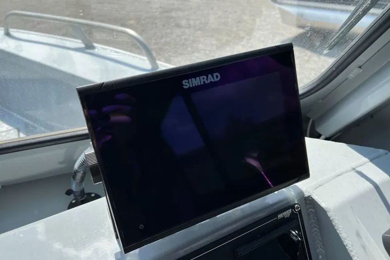Slide: The Image of Simrad display on 2021 Hewescraft 220 Ocean Pro ET boat dashboard. - 21