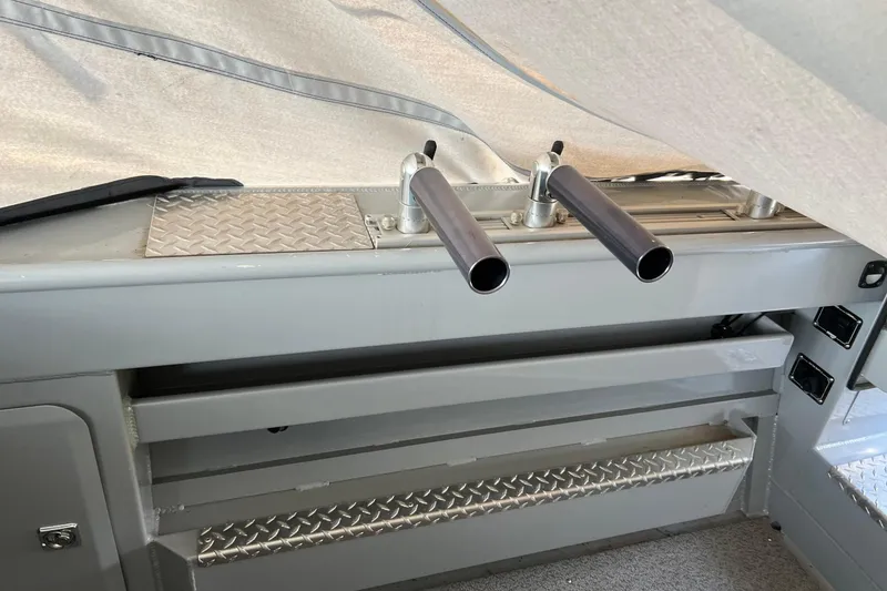 Slide: The Image of Interior view of 2021 Hewescraft 220 Ocean Pro ET boat with rod holders. - 30