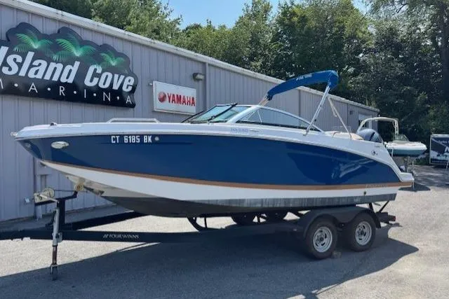 The Image of 2018 Four Winns HD220 OB boat on trailer at Island Cove Marina. - 1