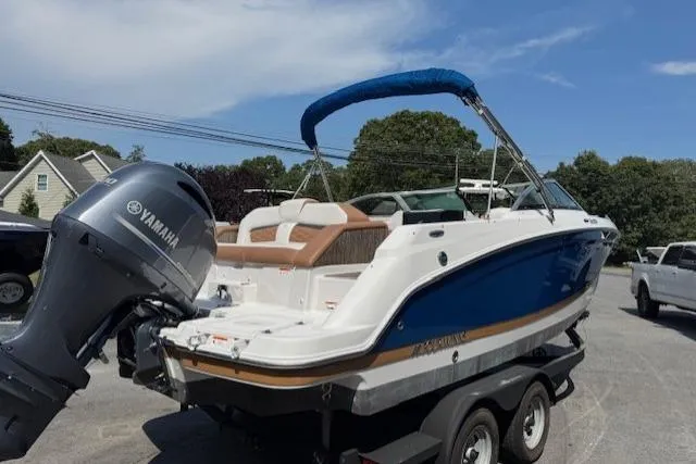 Slide: The Image of 2018 Four Winns HD220 OB boat with Yamaha outboard motor on a trailer. - 3
