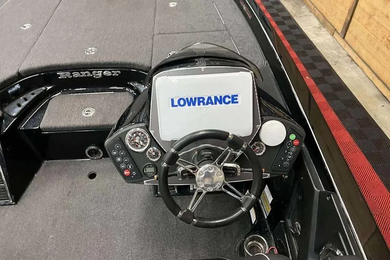 Slide: The Image of 2018 Ranger Z520C boat dashboard with Lowrance HDS display and steering wheel. - 5