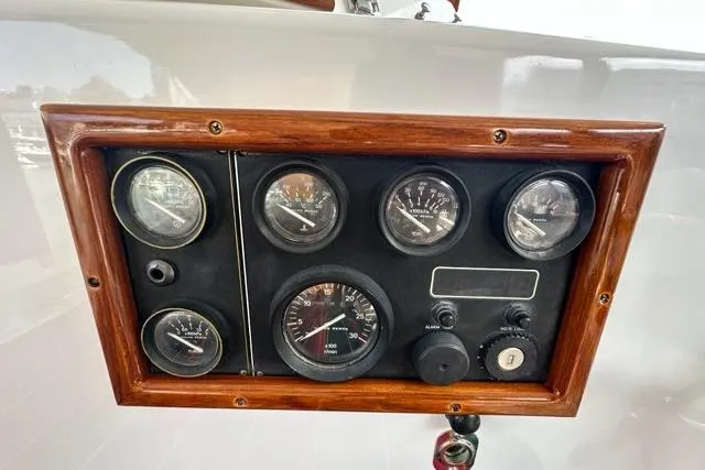 Slide: The Image of Vintage 1987 Holland 32 boat steering wheel with wooden handles. - 19