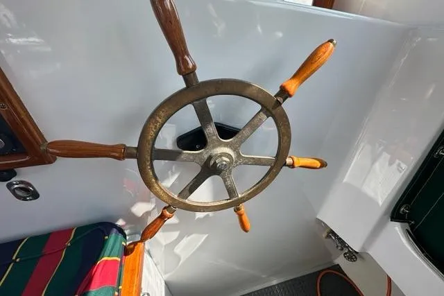 Slide: The Image of 1987 Holland 32 boat with Garmin radar, docked in a marina. - 20